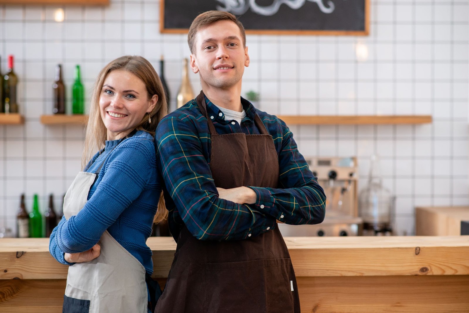 Female and male Franchise owners. Buying a Franchise Business vs Owning One